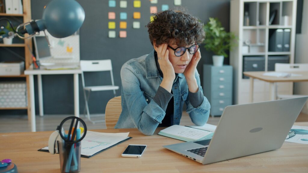 Student planning activities at a desk wondering if extracurricular consulting worth it